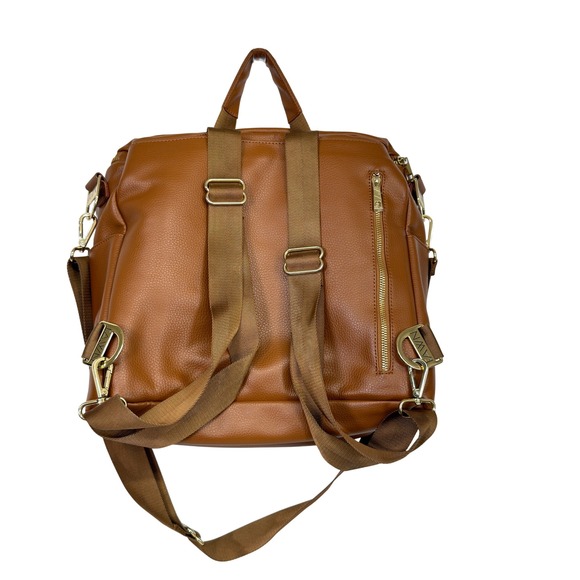 cognac vegan leather backpack La Jolie Its convertible design features a printed guitar strap for a distinctive Freshly Picked Classic Diaper Bag